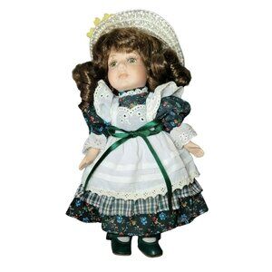 Porcelain Doll  9.5 Inches Tall Curly Brown Hair Green Eyes  JH1831200